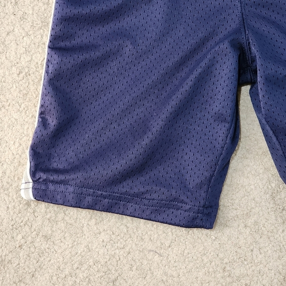 Blue carter's mesh shorts Size 7 - Picture 3 of 11